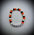 Orange, black, and white polymer, clay Halloween bracelet