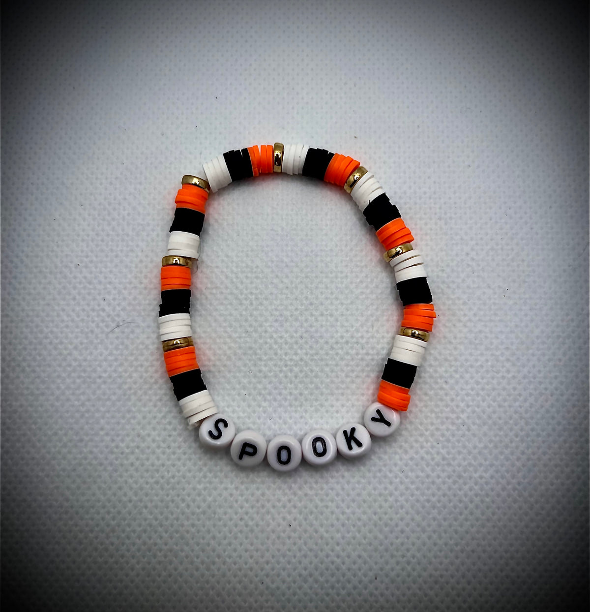 Orange, black, and white polymer, clay Halloween bracelet