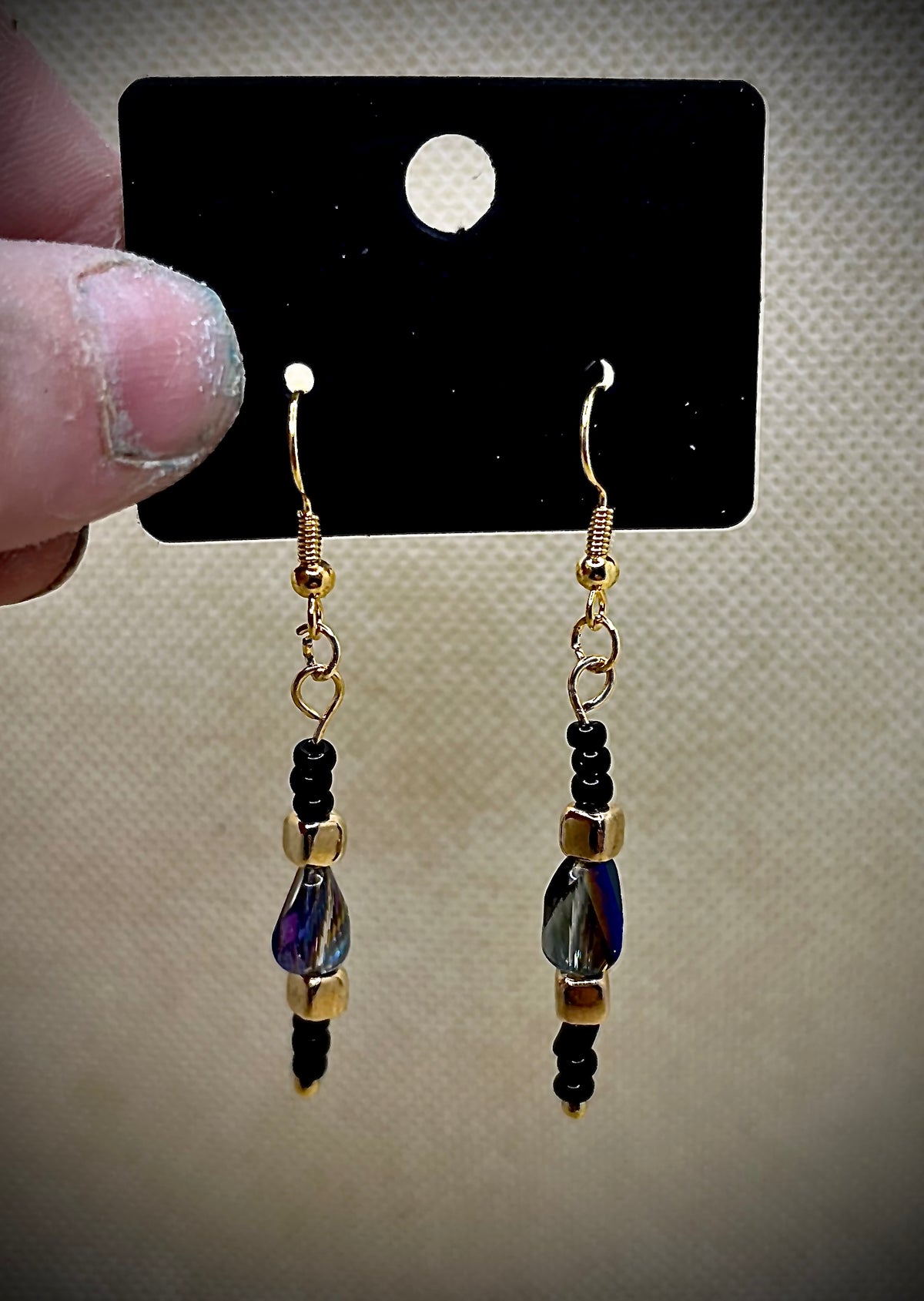 Iridescent, black dangle earrings