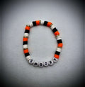 Orange, black, and white polymer, clay Halloween bracelet - Unchained Creations