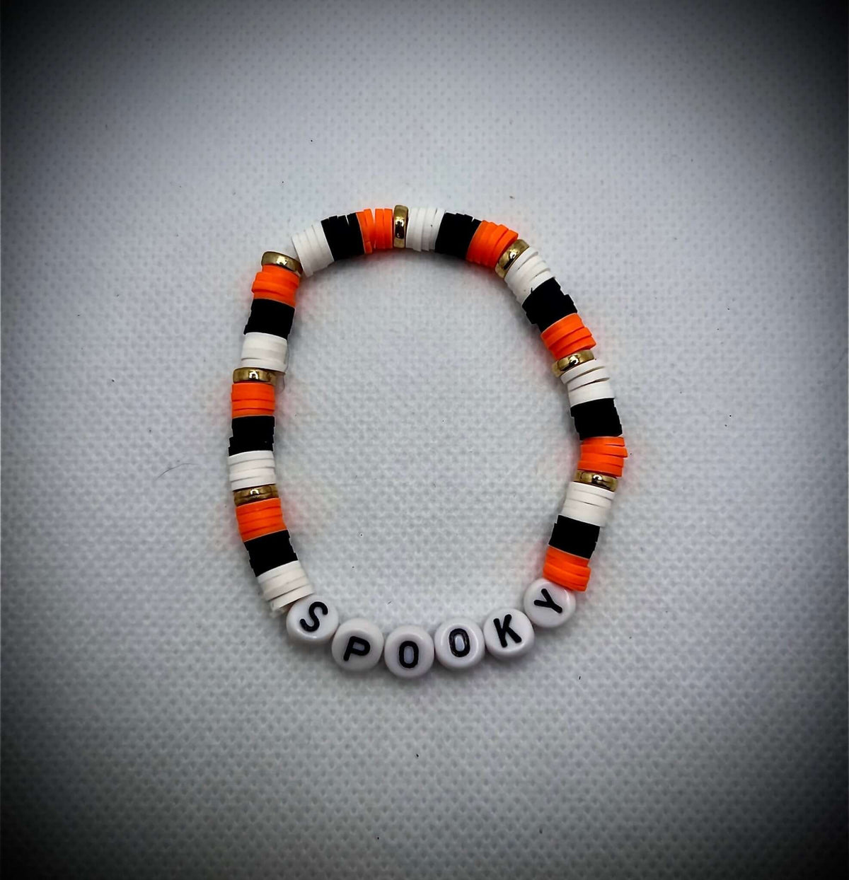 Orange, black, and white polymer, clay Halloween bracelet - Unchained Creations